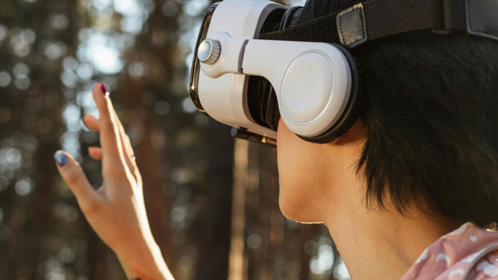 Person using VR headset with romantic or abstract colorful background.